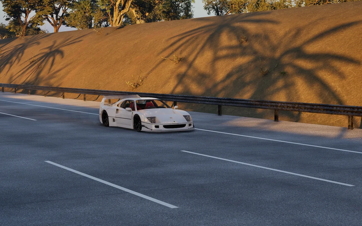A white sports car passing dry golden hills striped with palm shadows